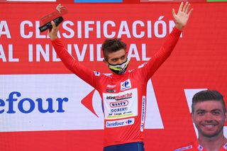 RINCON DE LA VICTORIA SPAIN AUGUST 24 Odd Christian Eiking of Norway and Team Intermarch Wanty Gobert Matriaux celebrates winning the Red Leader Jersey on the podium ceremony after the 76th Tour of Spain 2021 Stage 10 a 189km stage from Roquetas de Mar to Rincn de la Victoria lavuelta LaVuelta21 on August 24 2021 in Rincon De La Victoria Spain Photo by Stuart FranklinGetty Images