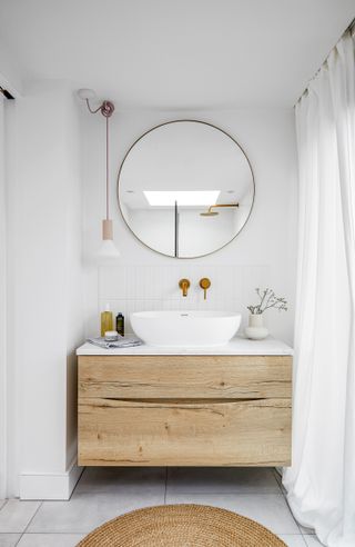 White bathroom with wooden vanity