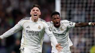 Fede Valverde of Real Madrid celebrates goal with teammate Vinicius Jr. during the LaLiga EA Sports match between Real Madrid CF and Atlético de Madrid at Estadio Santiago Bernabeu on March 22, 2026 in Madrid, Spain.