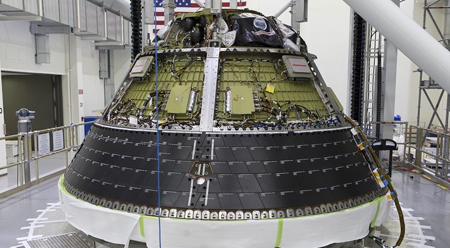 The Orion crew module for the Artemis-1 (formerly EM-1) mission undergoing testing earlier this year. NASA expects to mate the crew and service modules later this month and ship the spacecraft to Plum Brook for thermal vacuum testing a couple months later.