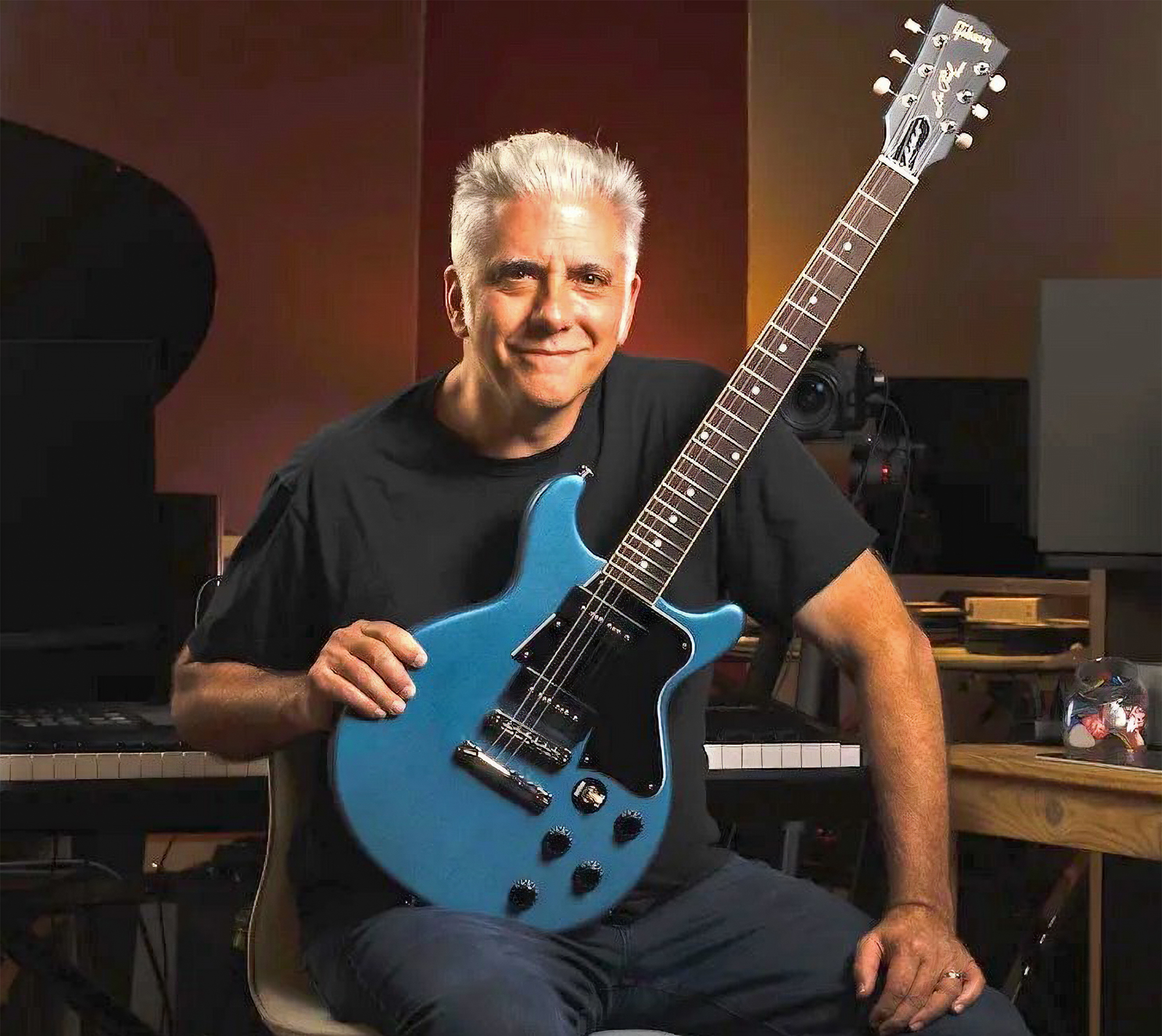 Rick Beato in his studio with a guitar