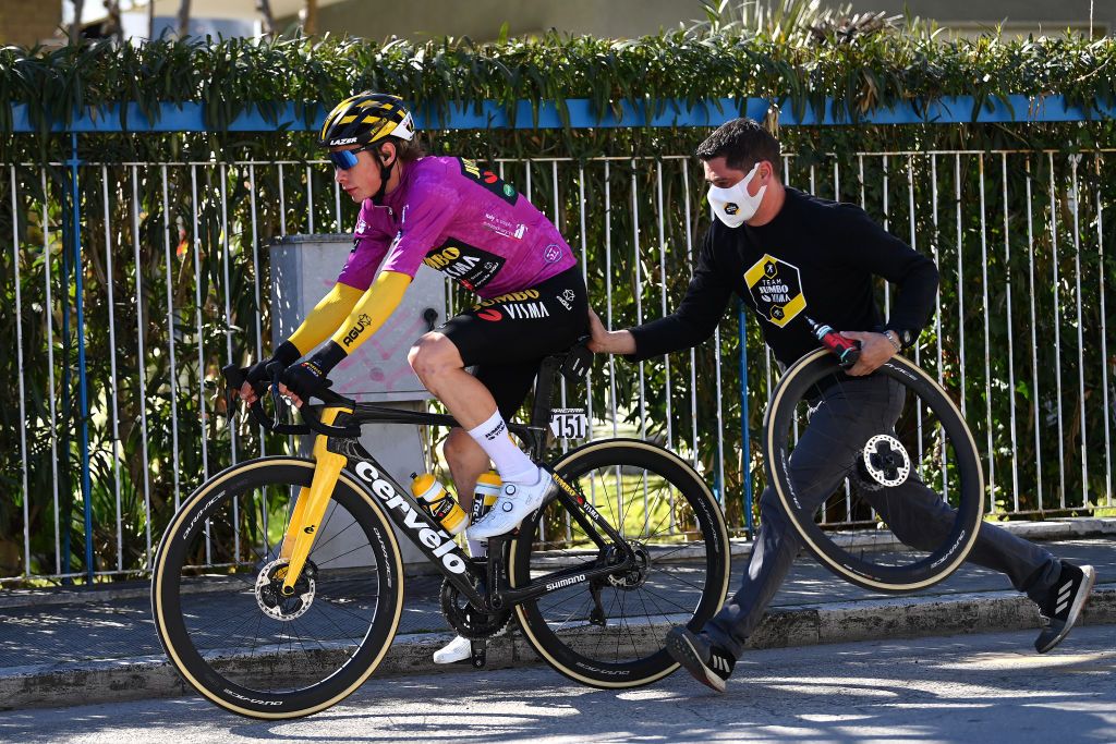 SAN BENEDETTO DEL TRONTO ITALY MARCH 13 Jonas Vingegaard Rasmussen of Denmark and Team Jumbo Visma Purple Sprint Jersey assisted due to a mechanical problem during the 57th TirrenoAdriatico 2022 Stage 7 a 159km stage from San Benedetto del Tronto to San Benedetto del Tronto TirrenoAdriatico WorldTour on March 13 2022 in San Benedetto del Tronto Italy Photo by Tim de WaeleGetty Images