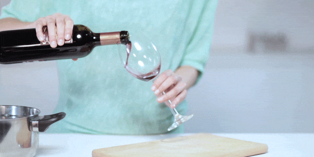 GIF &brvbar; Woman Pouring a Glass of Red Wine
