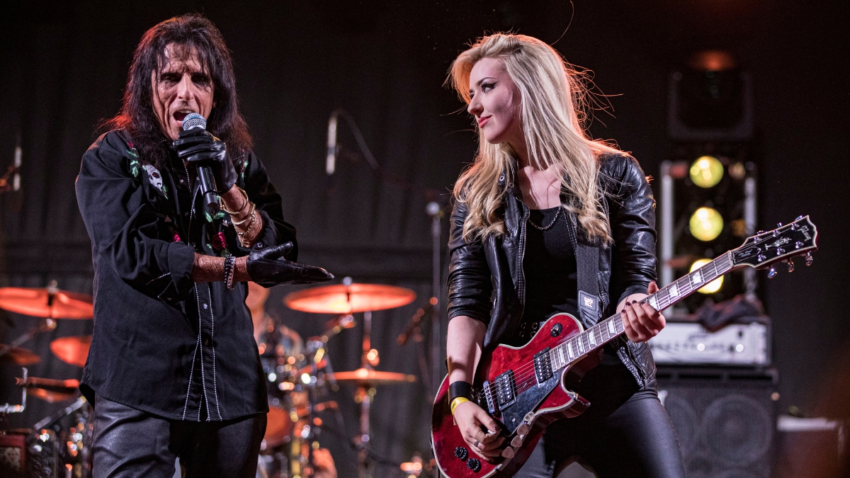 Alice Cooper (L) and Anna Cara perform on stage during Alice Cooper's CoopStock 2026 at Las Sendas Golf Club on April 11, 2026 in Mesa, Arizona
