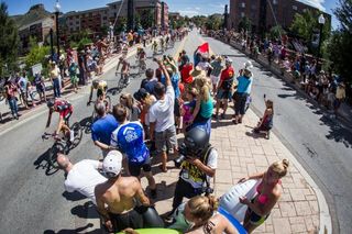 Fans cheer the riders along on stage 7 of the USA Pro Challenge