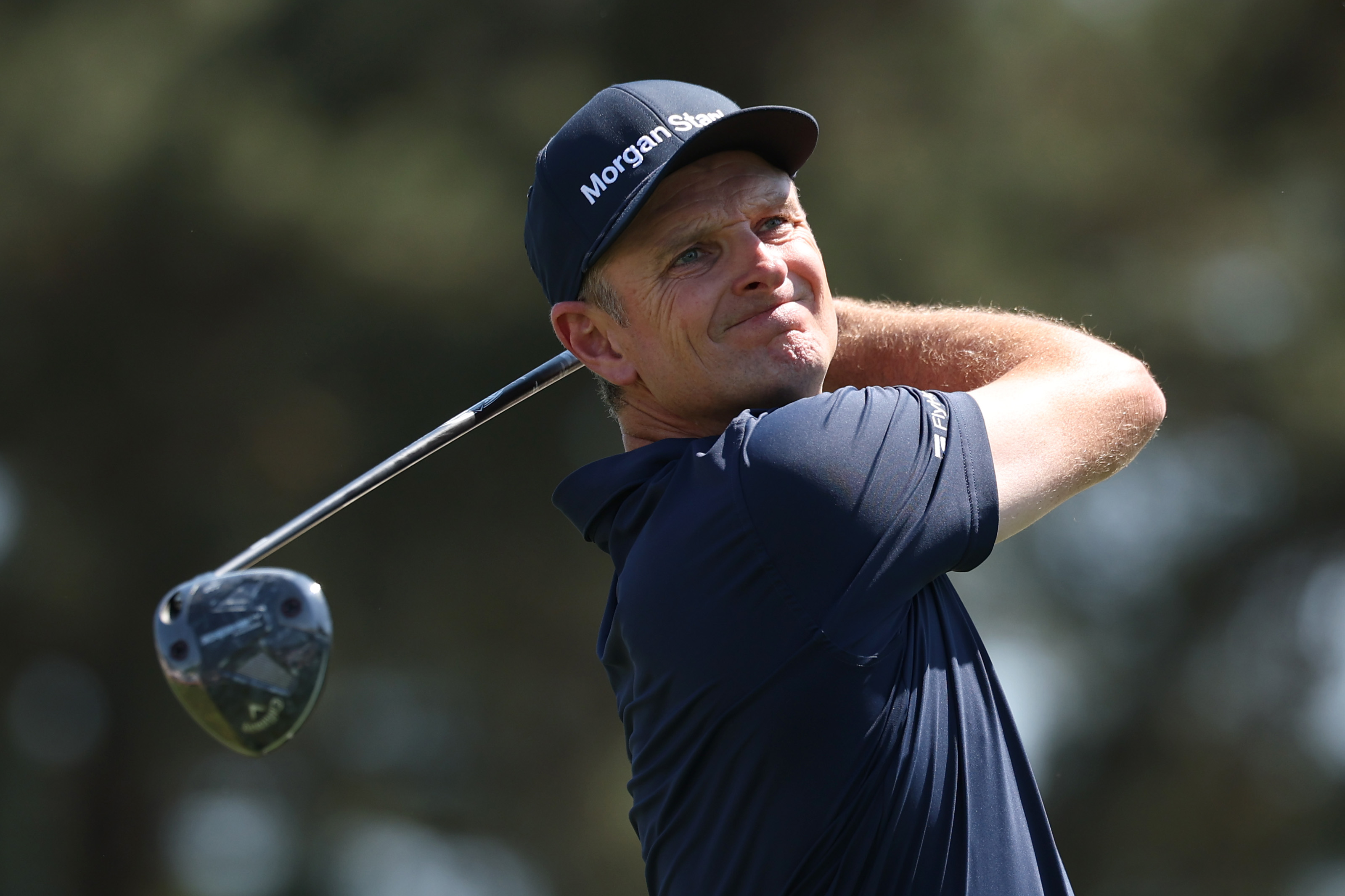 Justin Rose of England plays his shot from the third tee during the final round of the 2026 Masters Tournament at Augusta National Golf Club