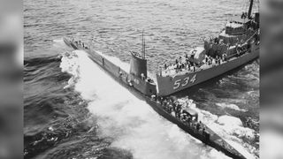 USS Stickleback was holed in a collision with destroyer escort USS Silverstein when it surfaced in an emergency during a naval exercise in 1958.