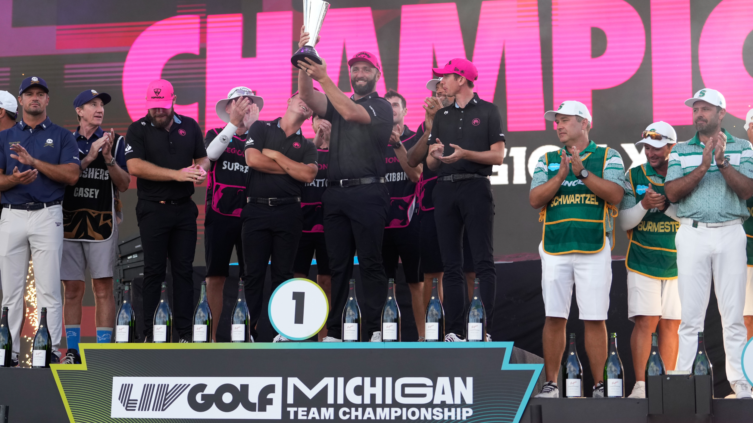 Legion XIII with the LIV Golf Team Championship trophy 