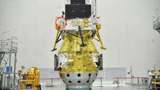 The China National Space Administration's Chang'e 6 sample-return probe and its mini-rover (circled) seen before launching to the far side of the moon.