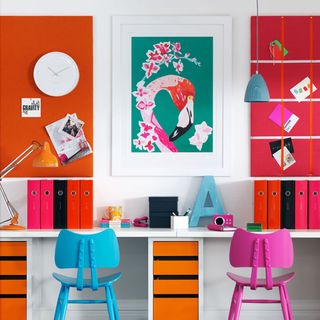 home office with bright orange wall panels