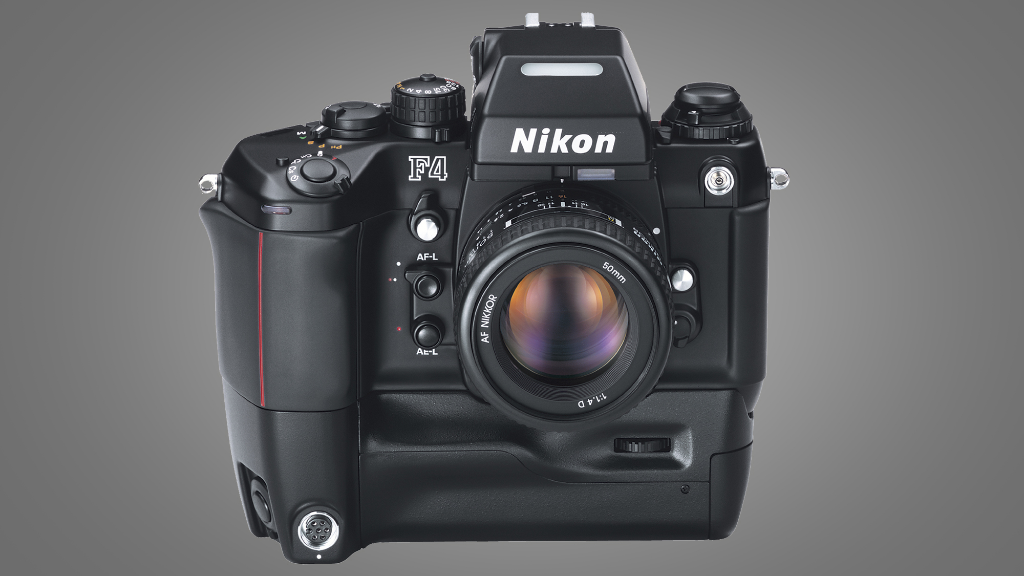 The Nikon F4 camera on a grey background