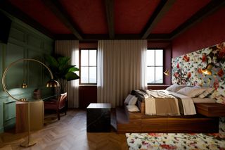 A room with bold wallpaper and a large bed at the Roxanich Wine and Design Hotel in Istria, Croatia
