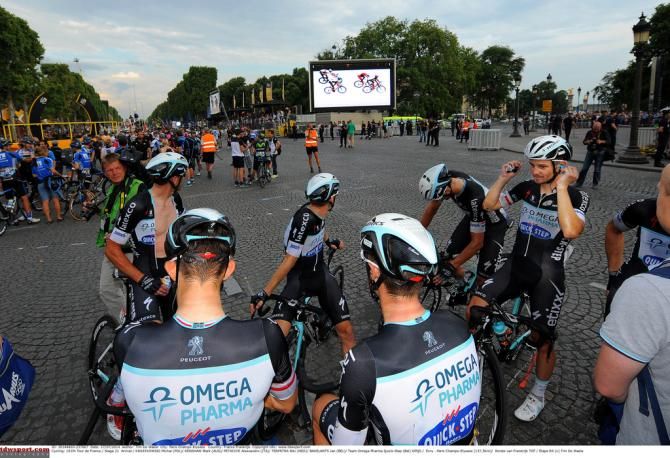 Omega Parma-Quick Step riders watch the sprint on the big screen
