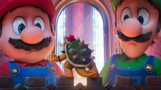 Mario and Luigi looking wide-eyed at a tiny Bowser in The Super Mario Galaxy Movie