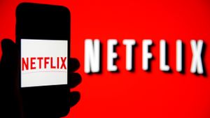 Netflix logo on screen and phone