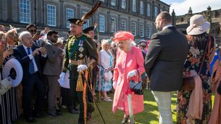 Queen Elizabeth II hosts a garden party at The Palace Of Holyroodhouse on July 3, 2019 in Edinburgh, Scotland