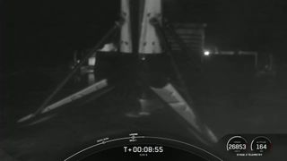 The SpaceX Falcon 9 rocket booster that launched the SXM-8 Sirius XM satellite is seen just after lading on the drone ship Just Read The Instructions after a successful launch.