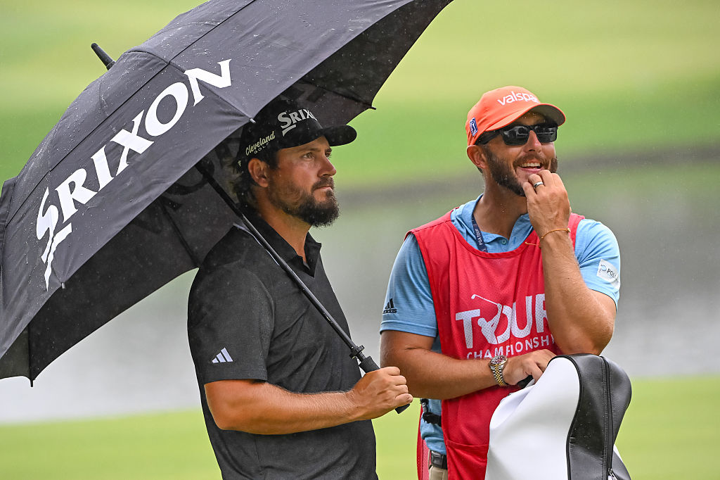 Andrew Novak and caddie, Jeff Hamley who is wearing an orange Valspar hat