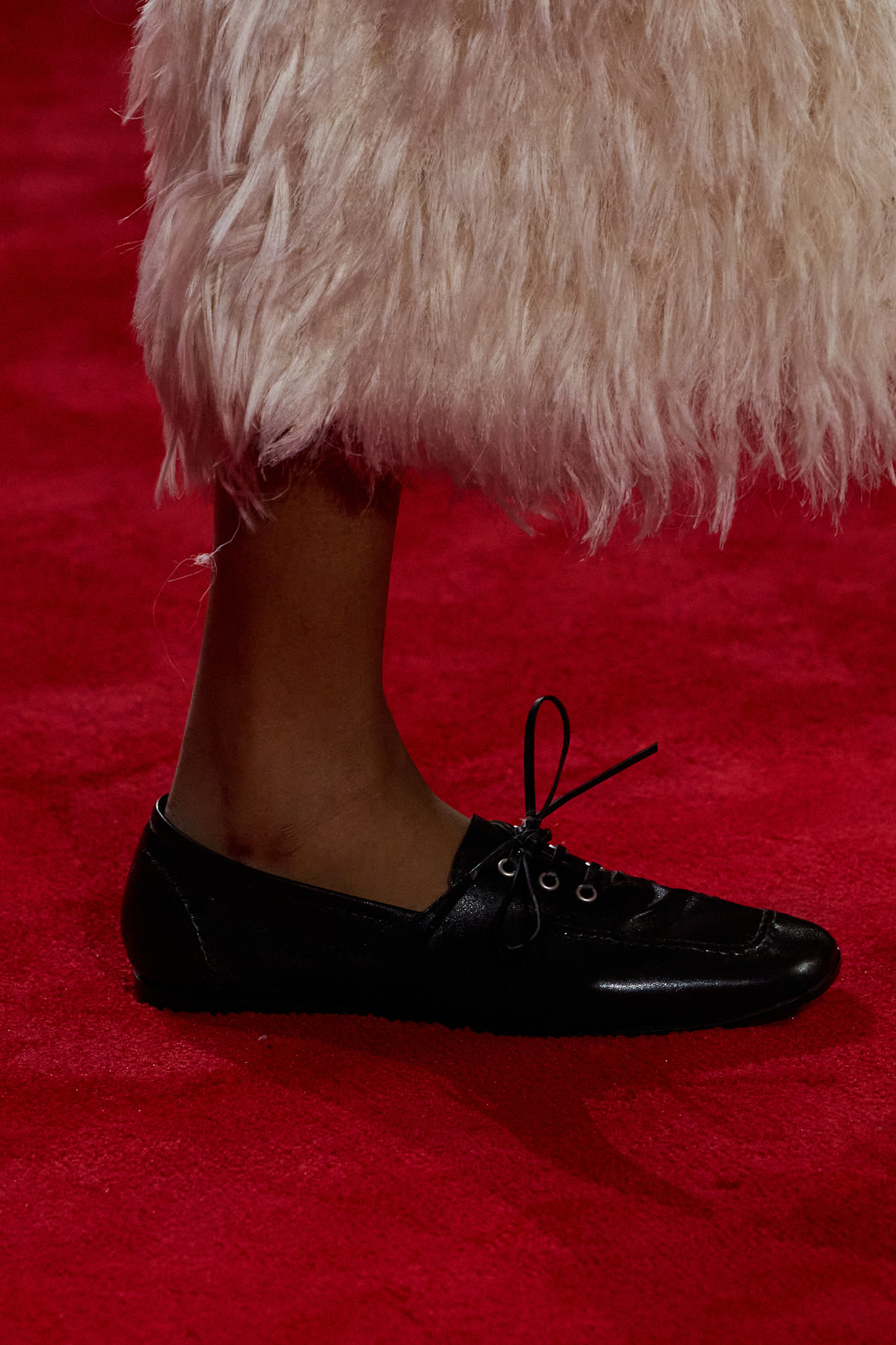 Detail image of a Bottega Veneta derby shoe on the fall/winter 2026 runway.