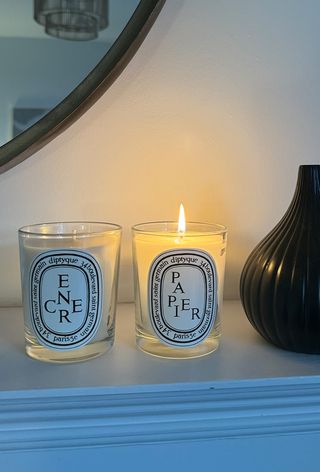 Diptyque Papier and Encre candles on mantle