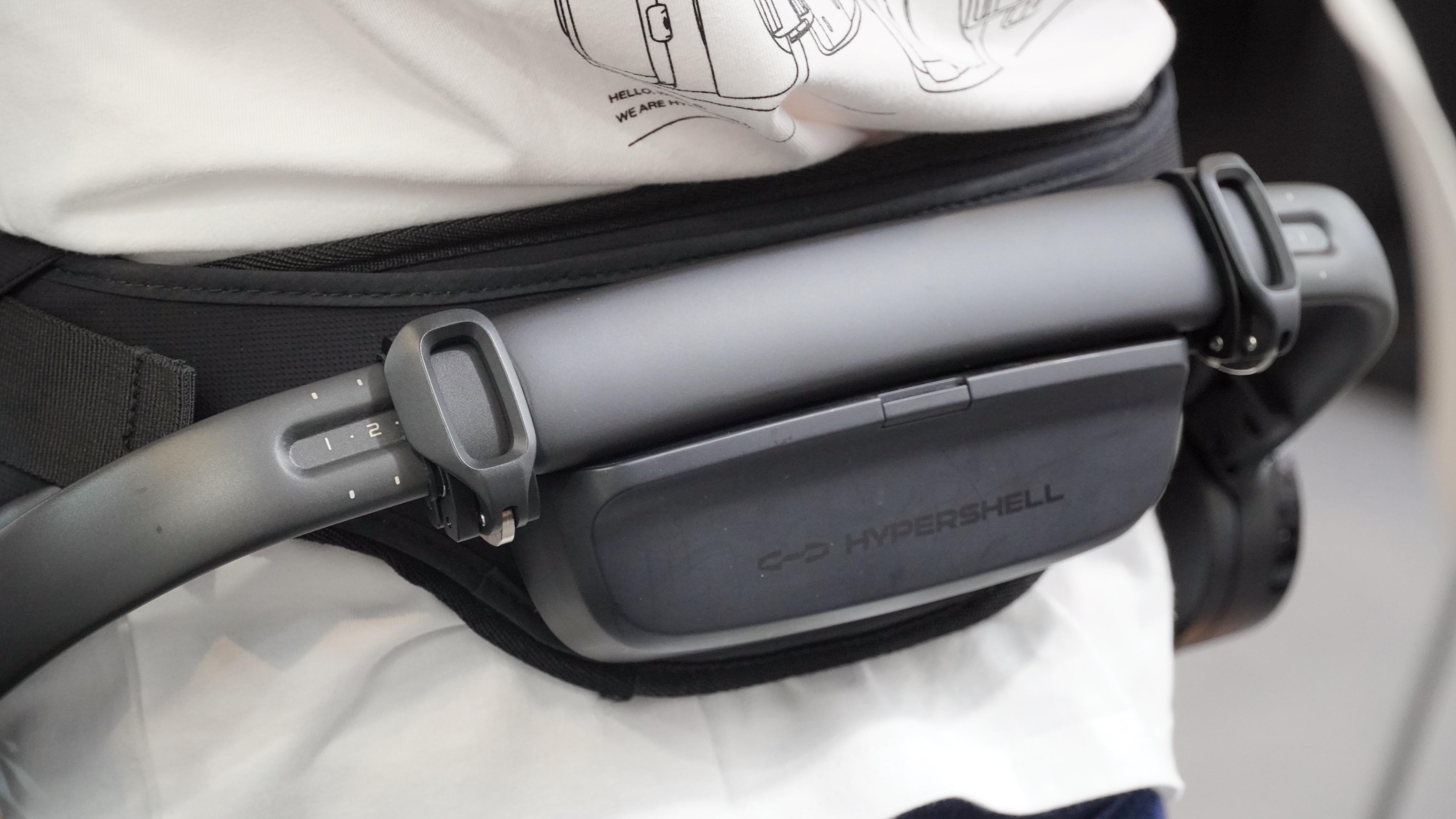 The Hypershell X Ultra at IFA 2025 being worn showing the battery pack.