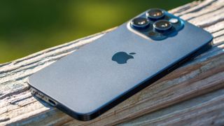 iPhone 15 Pro Max on ledge