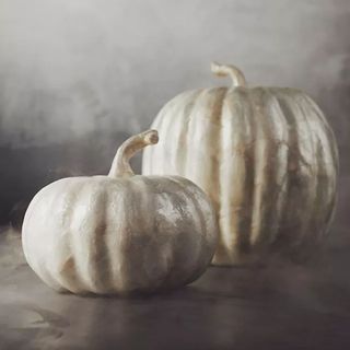 white set of faux pumpkins