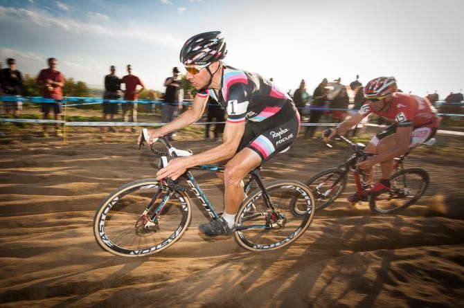 Jermey Powers (Rapha Focus) and Todd Wells (Specialized) riding throough the sand pit and maintining a slight advantage of the chase group containing Berden (Raleigh Clement) and Summerhill (K-Edge). Boulder Cup.