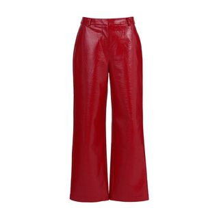 Cutout of Kitri's red vinyl trousers