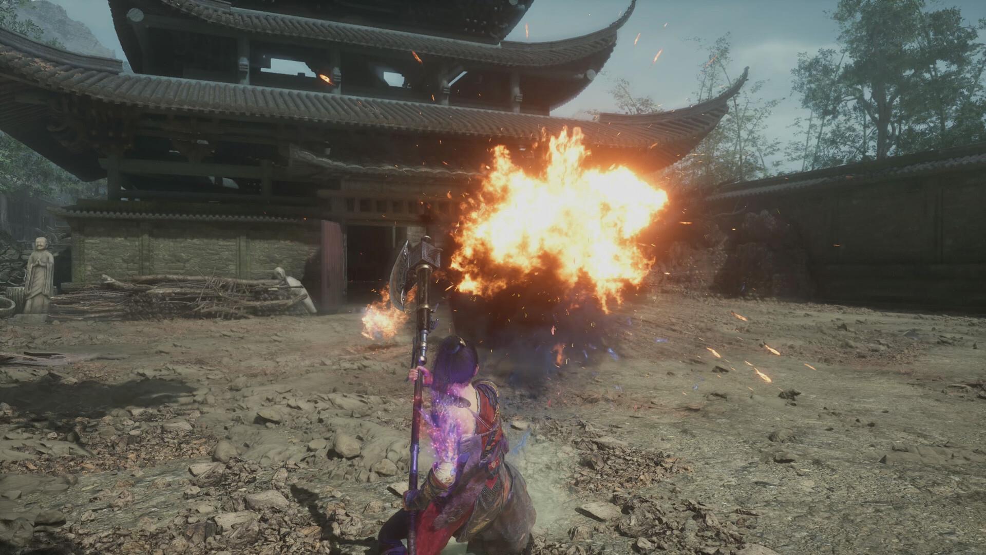 Fighting a fiery boss enemy in Wuchang: Fallen Feathers