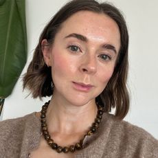 Headshot of beauty editor Grace Day with bob haircut