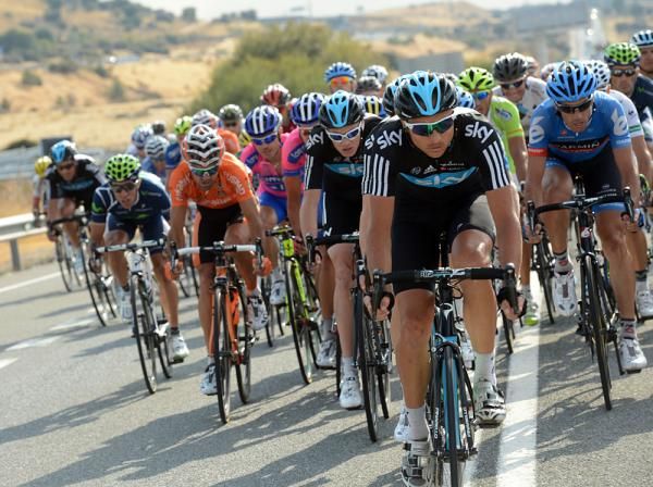 Danny Pate and Chris Froome lend a hand at the front.