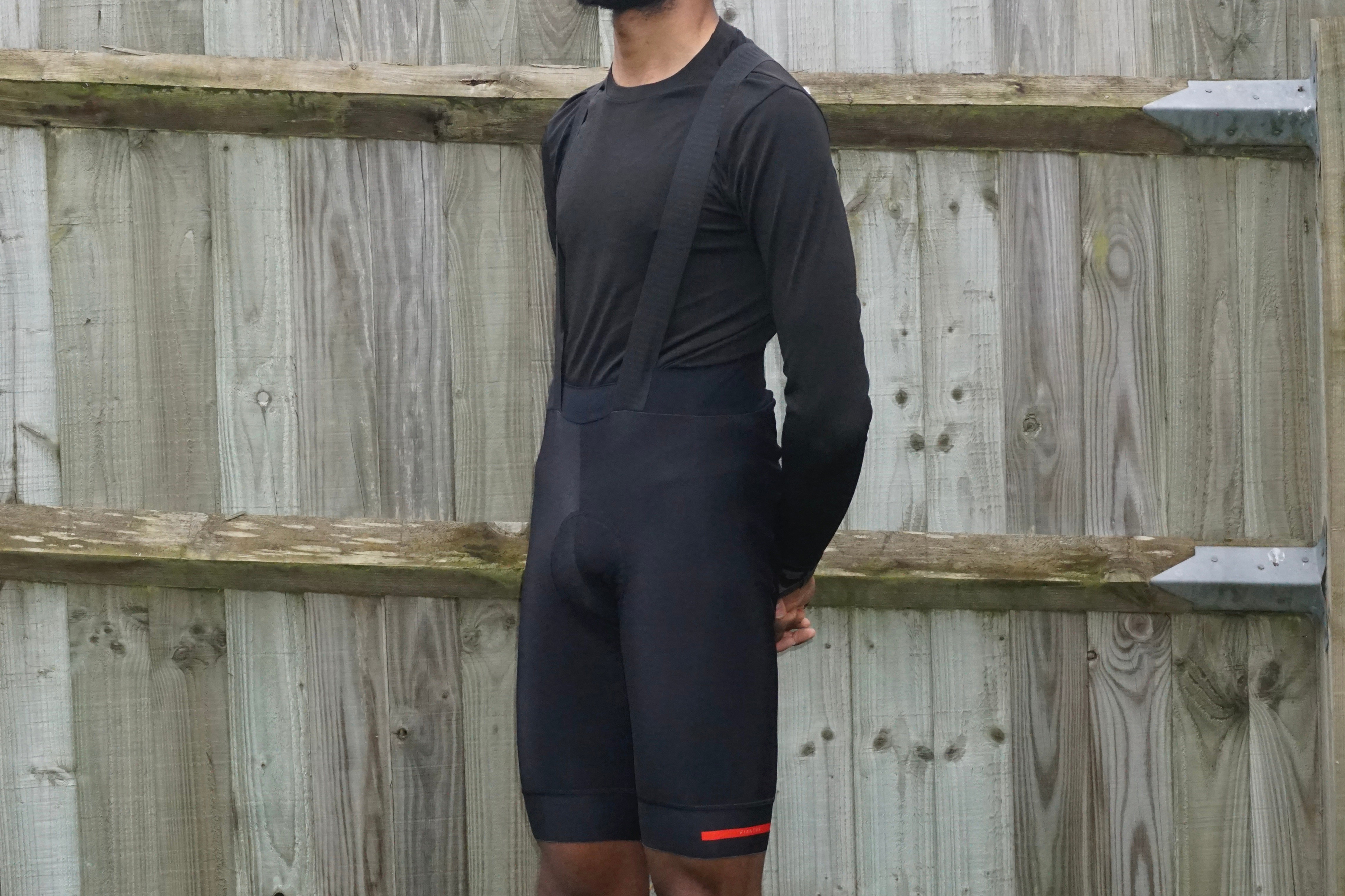 A man poses in a black pair of Sportful Fiandre bib shorts