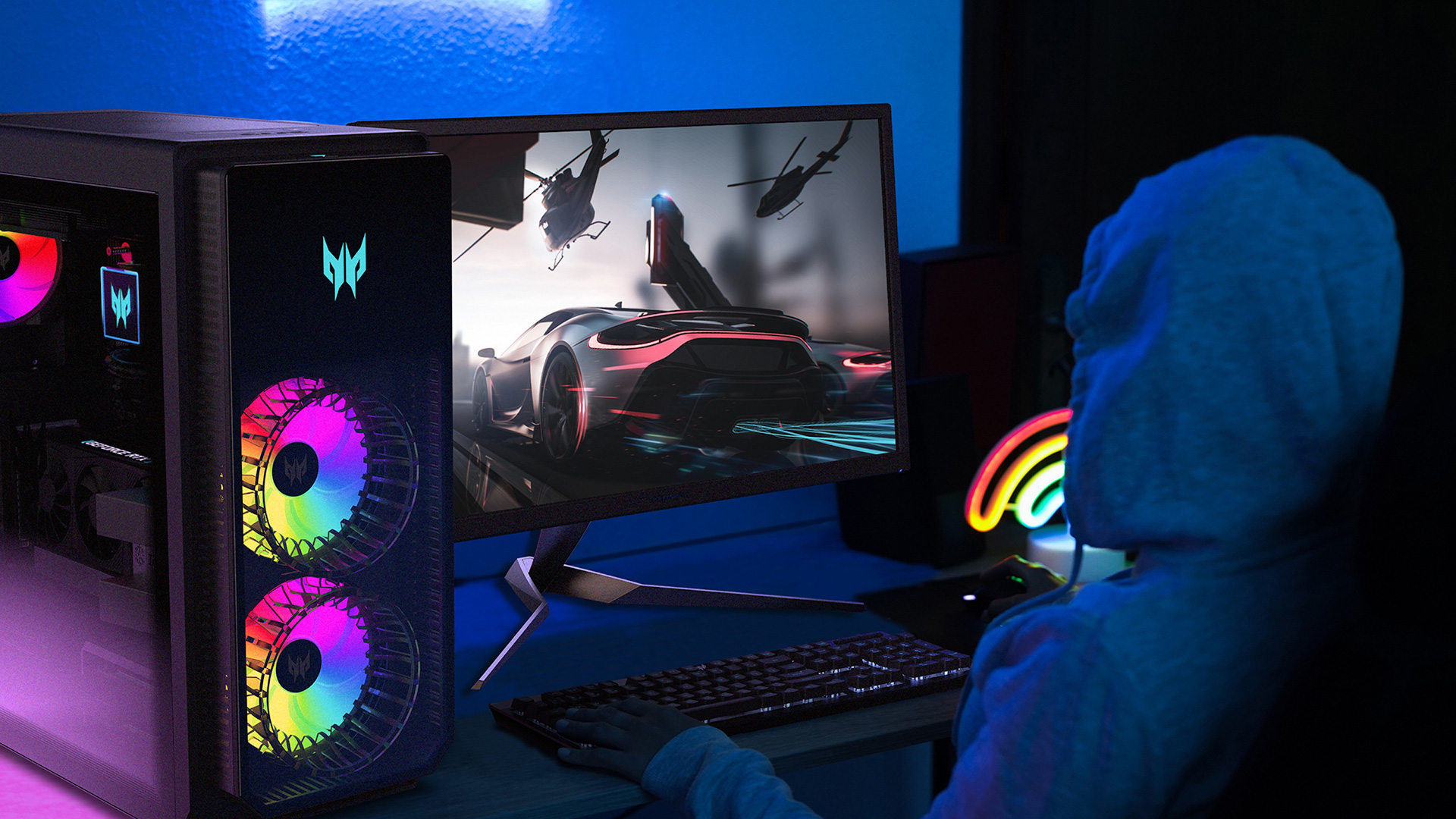 An Acer Predator Orion 7000 gaming PC displayed on a desk next to a monitor