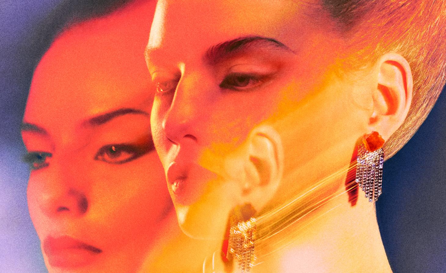 Woman wearing earrings by Pierre Hardy for Hermès high jewellery