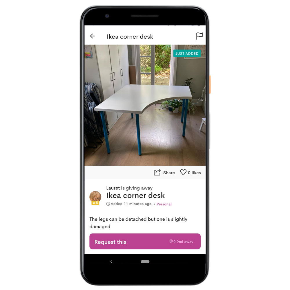 mobile phone displaying ikea advertise of corner desk image