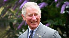 King Charles III smiling 