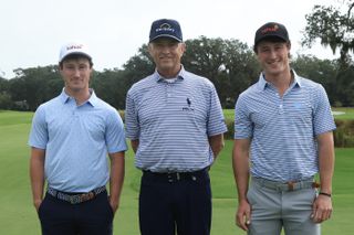 David Ford of the United States, Davis Love III of the United States and Maxwell Ford of the United States pose for a photo on the tenth tee during the first round of The RSM Classic on the Plantation Course at Sea Island Resort on November 16, 2023 in St Simons Island, Georgia.