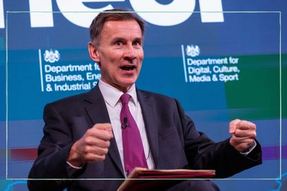 Jeremy Hunt giving a speech from behind a lectern