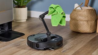 Roborock Saros Z70 robot vacuum holding a cloth