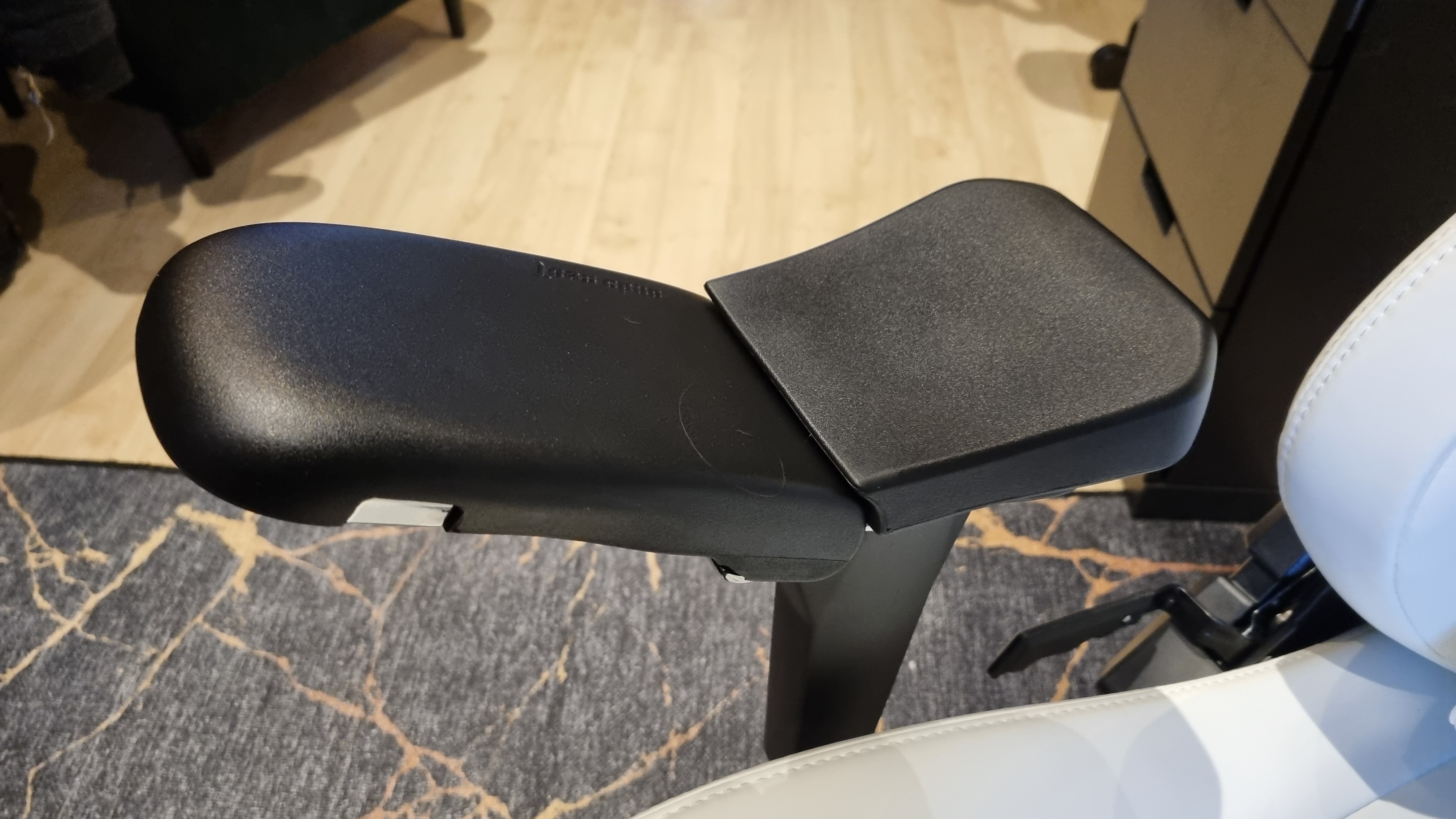 The 5D armrests of the AndaSeat Kaiser 4 XL in an upwards position