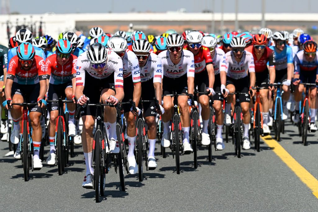 JEBEL JAIS UNITED ARAB EMIRATES FEBRUARY 21 LR Vegard Stake Laengen of Norway Ivo Oliveira of Portugal Juan Sebastian Molano of Colombia Mikkel Bjerg of Denmark Brandon McNulty of The United States Red Leader Jersey Jay Vine of Australia and Adam Yates of Great Britain and Team UAE Emirates lead the peloton during the 6th UAE Tour 2024 Stage 3 a 176km stage from Al Marjan Island Al Jazirah Al Hamra to Jebel Jais 1489m UCIWT on February 21 2024 in Jebel Jais United Arab Emirates Photo by Tim de WaeleGetty Images