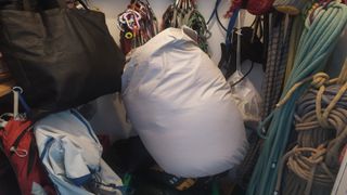 sleeping bag in storage cupboard