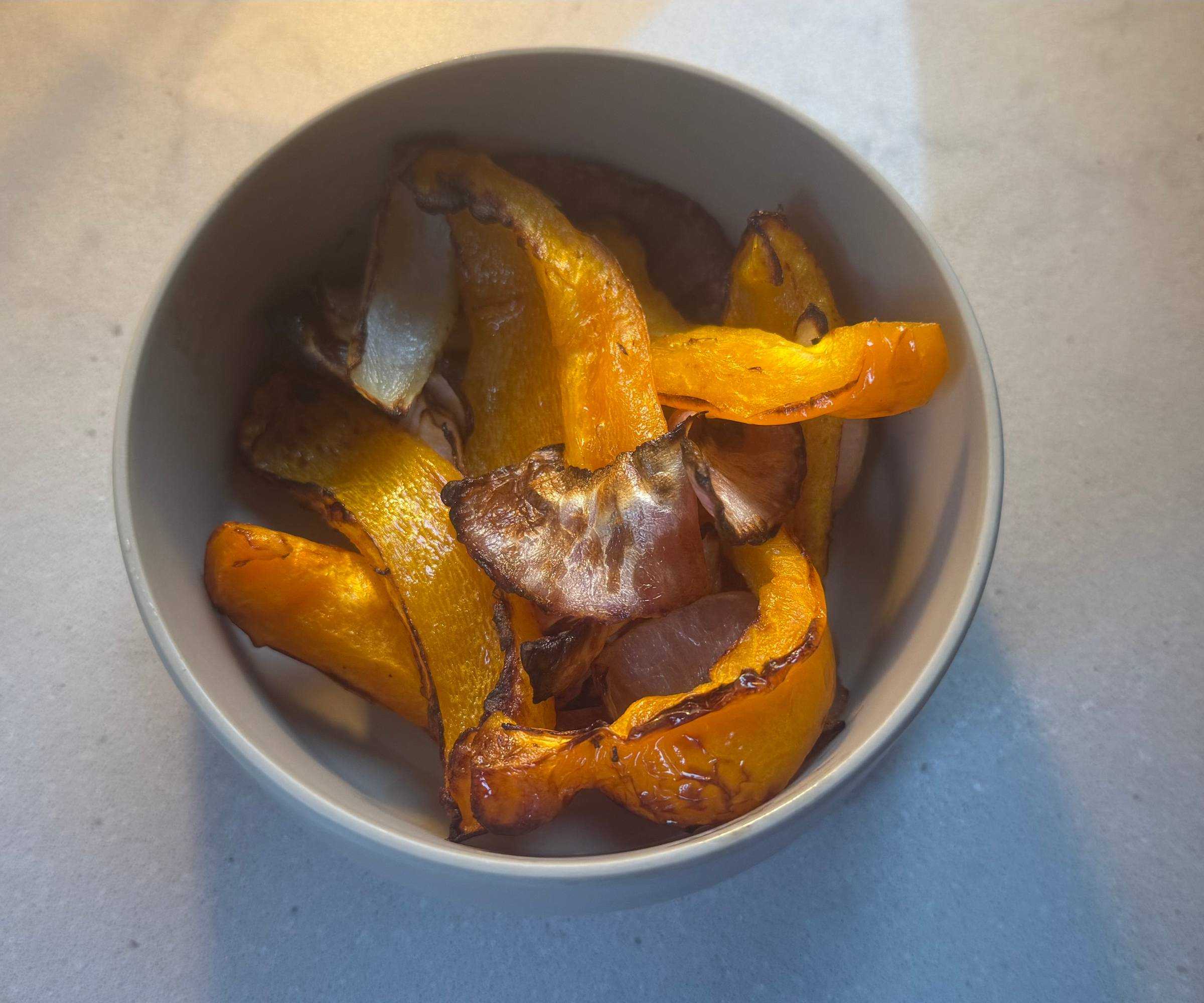 Roasted veggies in a bowl, cooked in the Bella FitsAnywhere 4QT Air Fryer
