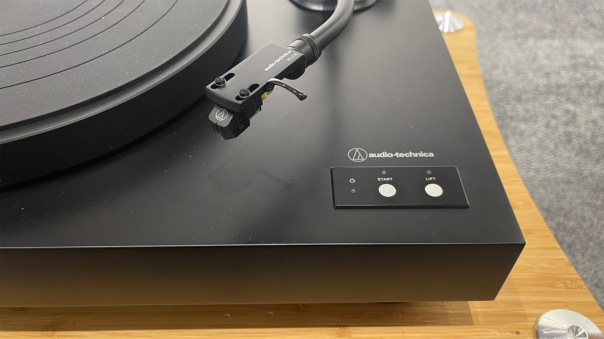 Audio-Technica AT-LP8X turntable detail of tonearm and control buttons