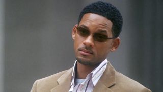 Will Smith looking at Albert's awkward antics in Hitch.