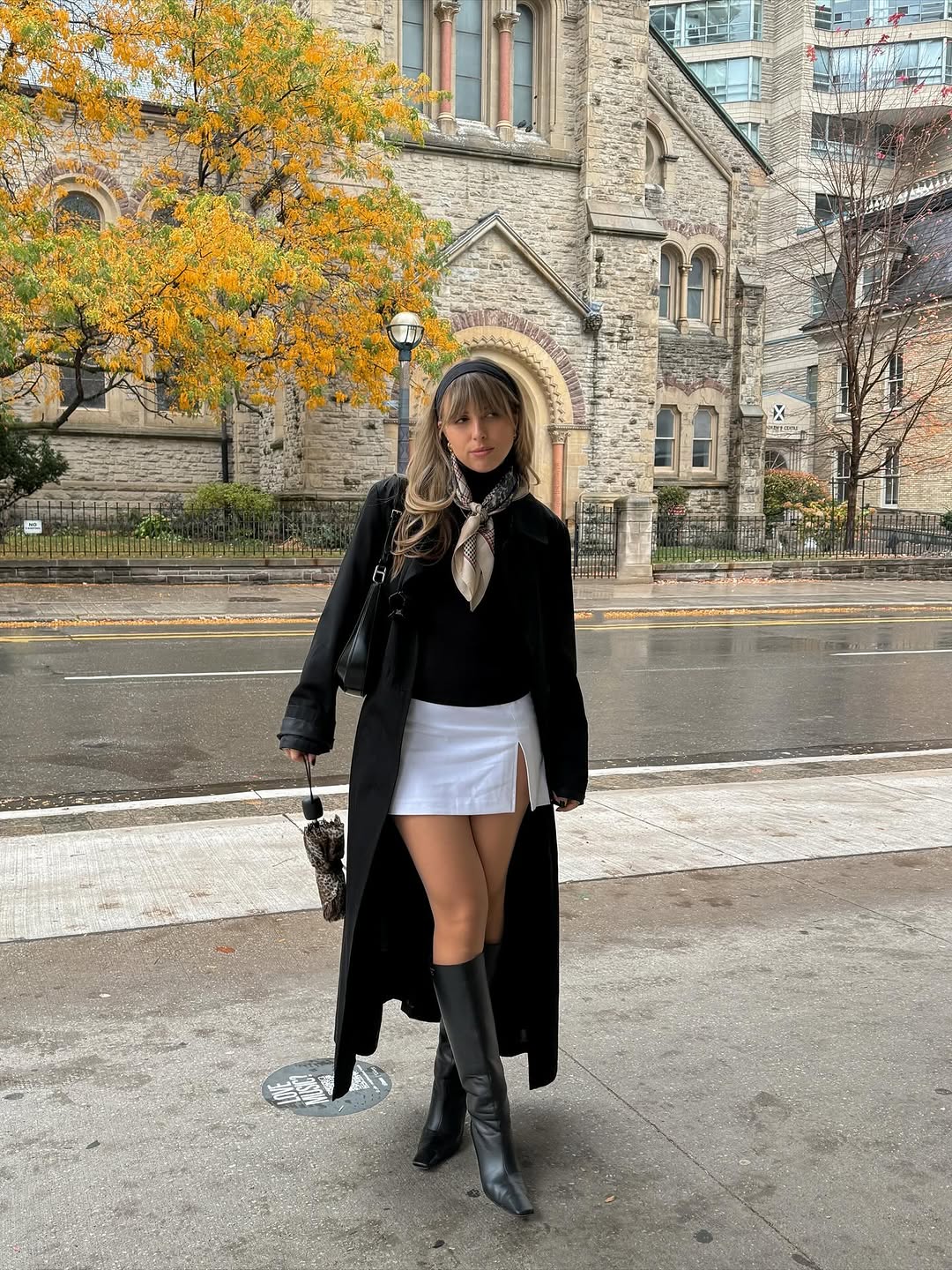 woman wearing black turtleneck outfit fall 2025