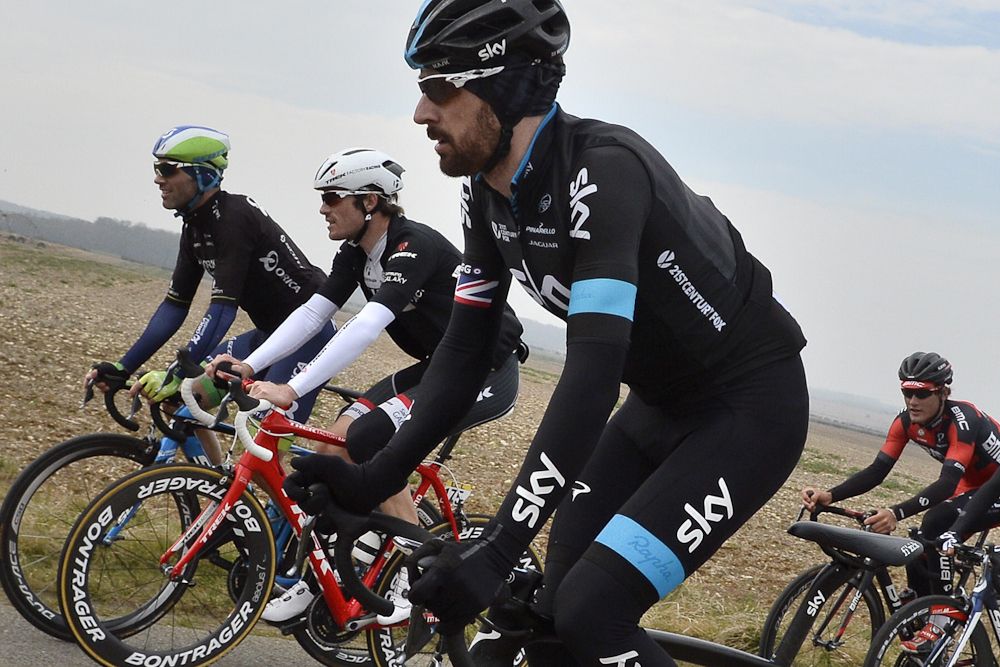 Great Britain's Bradley Wiggins rides in the pack during the second stage of Paris-Nice.