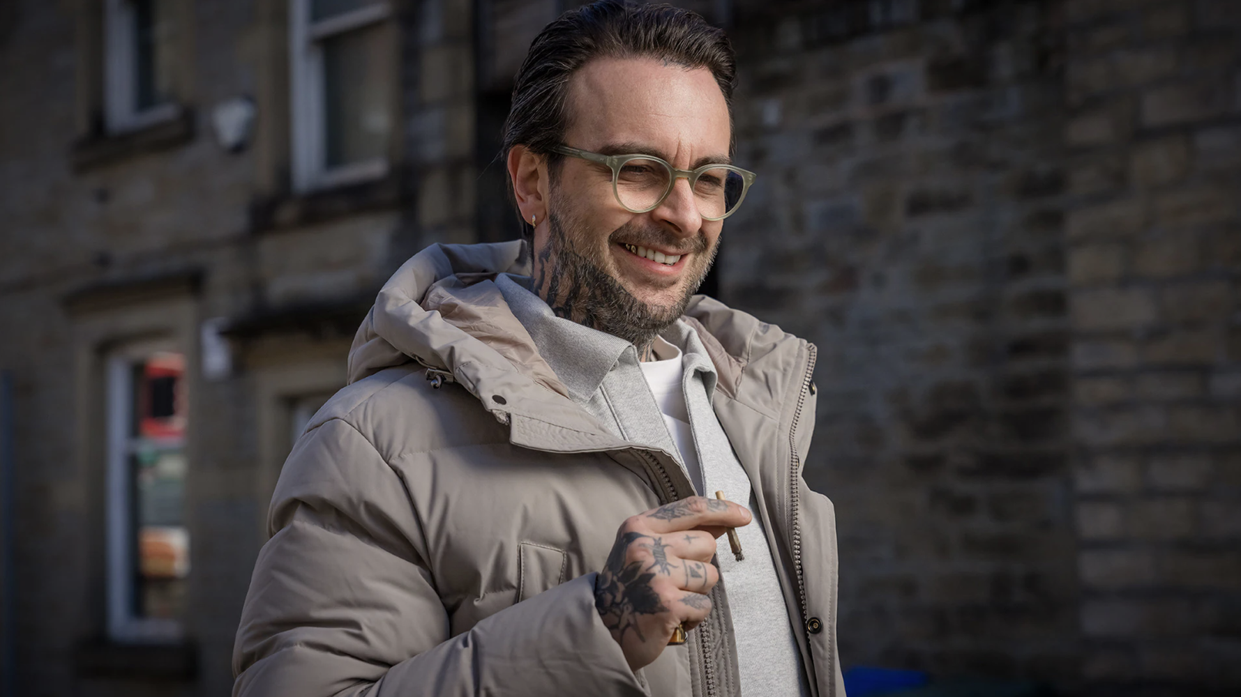 Vinnie O'Neill (Joe Gilgun) smiling in Brassic season 7