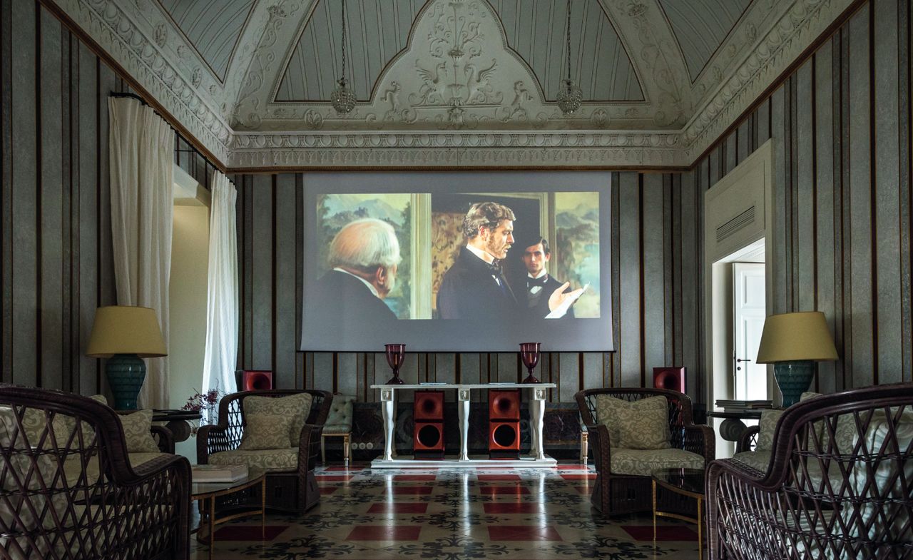 A large screen showing a movie